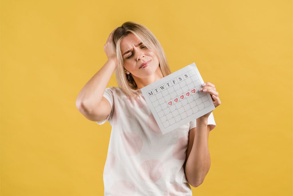 Woman experiencing menstrual period symptoms