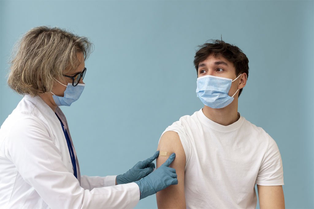 Man receiving a flu vaccination